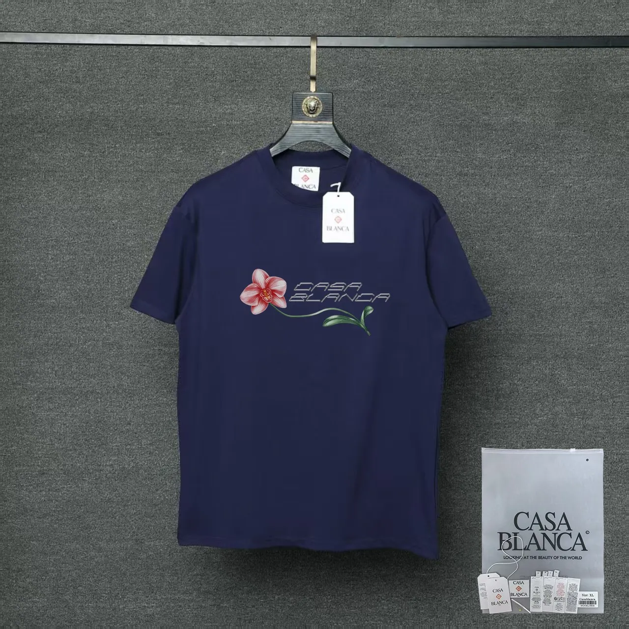26ss CASABLANCA original printing process short-sleeved T-shirt original development using high-density double yarn pure cotton fabric upper body soft and comfortable color Black White Dark Green color Orange Pink Blue Royal Blue color cigarette powder 8 colors Sizes S M L XL